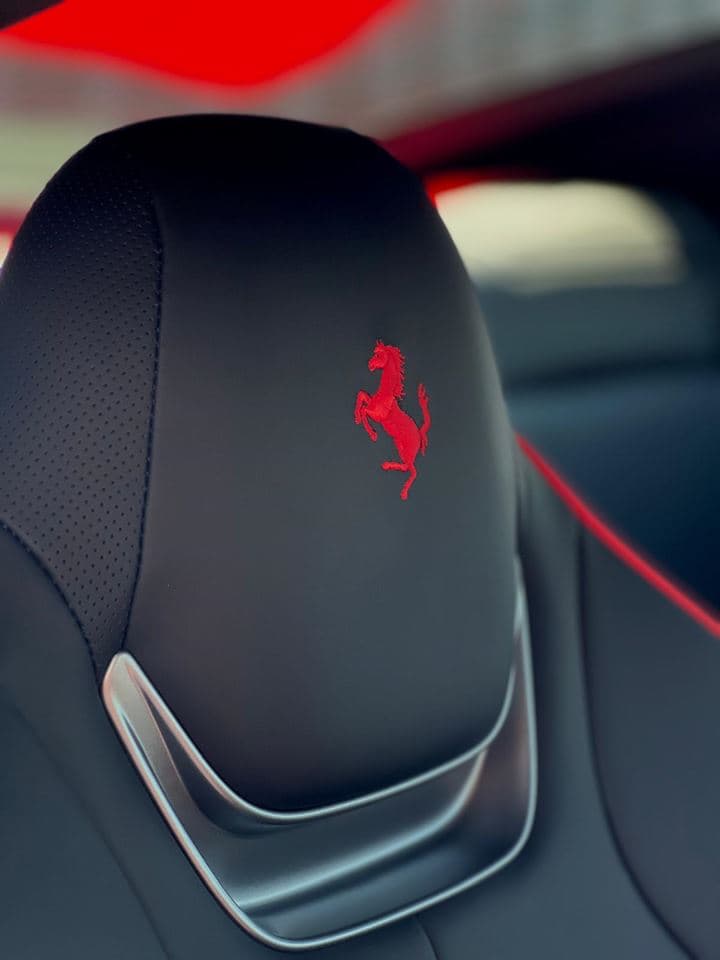 Ferrari — Embroidered prancing-horse headrest (Upholstery)