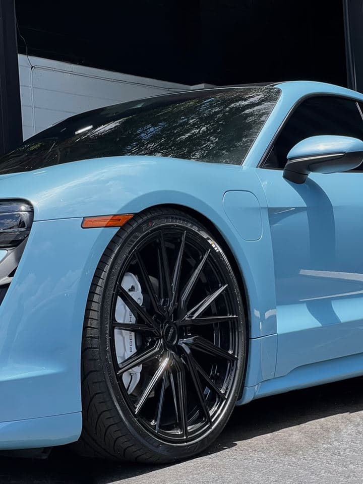 Porsche Taycan — Black multi-spoke wheels, white calipers (Rims & Tires)